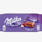 Milka alpesi tejcsokoládé mazsolával és mogyoródarabokkal 90g